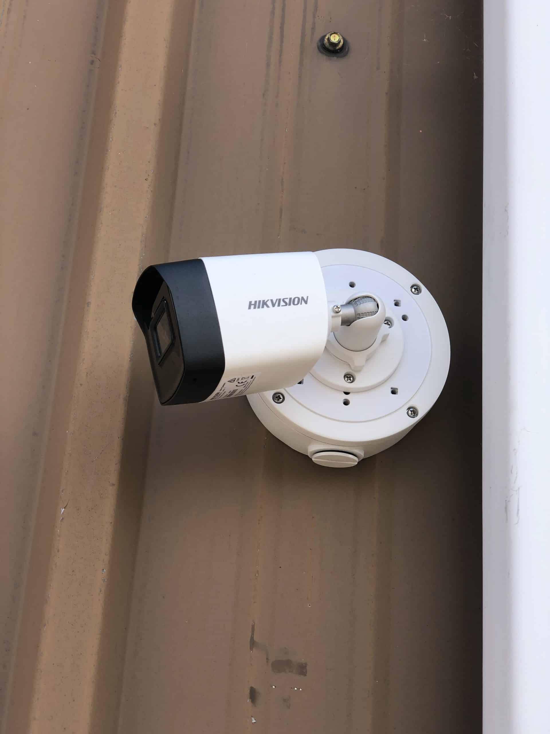 outdoor security cameras - A cctv camera mounted on the side of a building.