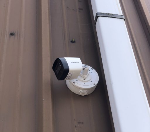 Cctv camera on the side of a building.